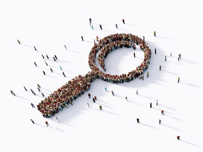 Human Crowd Forming A Big Magnifier Symbol Human Crowd Forming A Big Magnifier Symbol