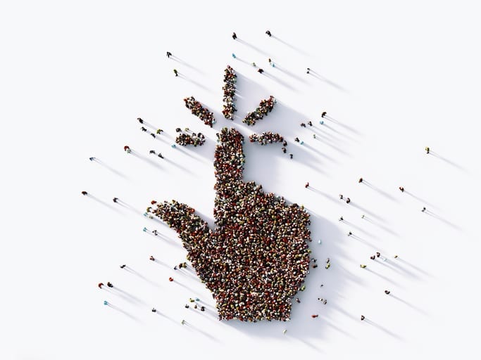 Human Crowd Forming A Submit Symbol